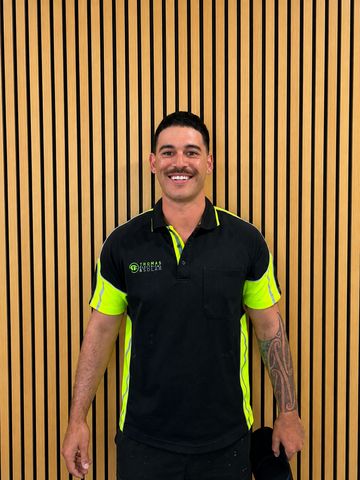 A Thomas Electrical and Solar team member in uniform
