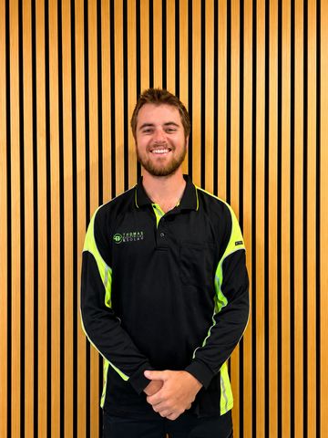 A Thomas Electrical and Solar team member in uniform