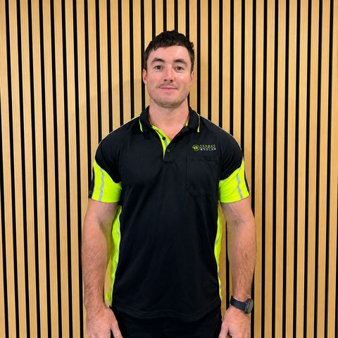 A Thomas Electrical and Solar team member in uniform