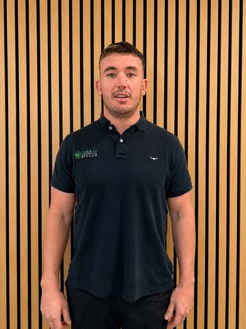 A Thomas Electrical and Solar team member in uniform
