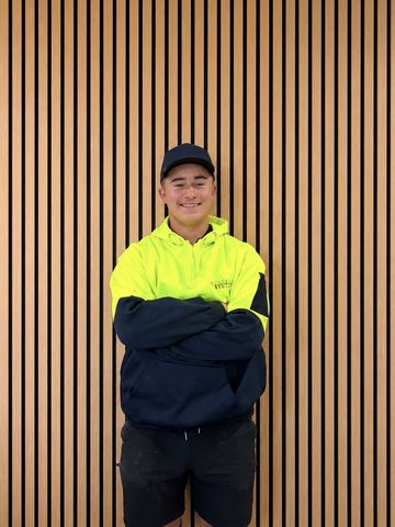 A Thomas Electrical and Solar team member in uniform