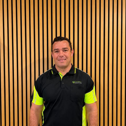 A Thomas Electrical and Solar team member in uniform