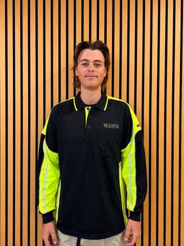 A Thomas Electrical and Solar team member in uniform