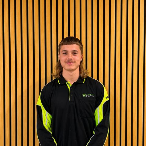 A Thomas Electrical and Solar team member in uniform