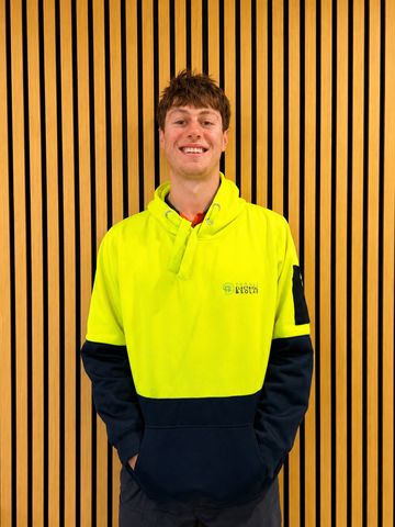 A Thomas Electrical and Solar team member in uniform